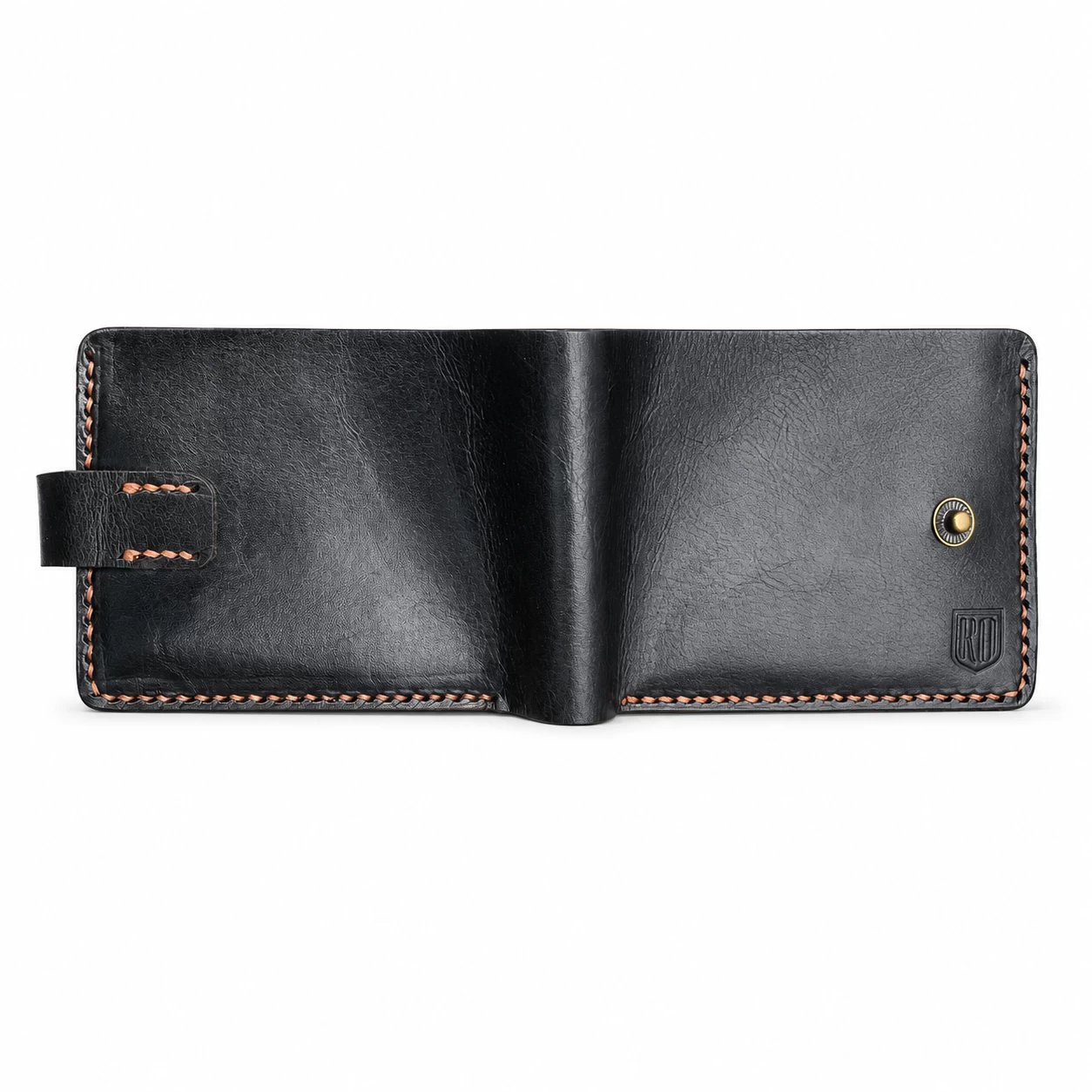 Black handcrafted leather bifold wallet exterior with hand stitched edges and slim minimalist design.