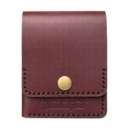 Front view of Rox & Oak veg tan leather slim wallet with brass snap button.